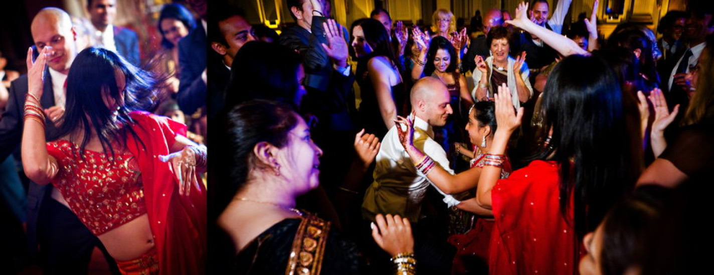 A packed dance floor at an Indian wedding reception